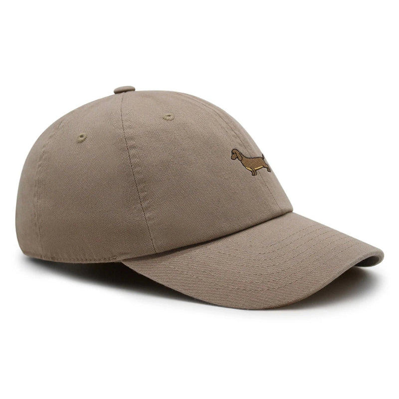 A collection of Dachshund baseball caps in various colors, all featuring a small embroidered dachshund design on the front.