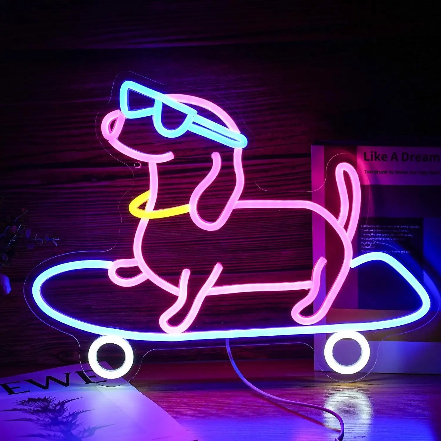 A set of LED neon signs featuring colorful illustrations of a dachshund dog in various playful poses, including riding a skateboard and wearing sunglasses.