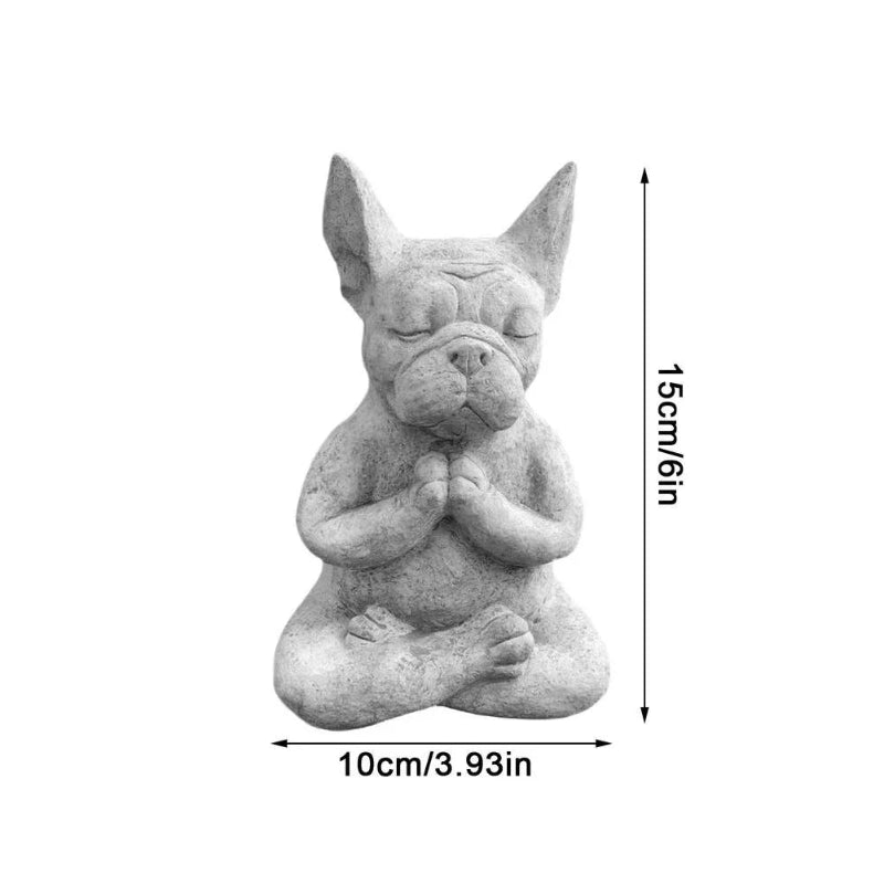 Statue of a dog in a meditative pose with measurements on a white background