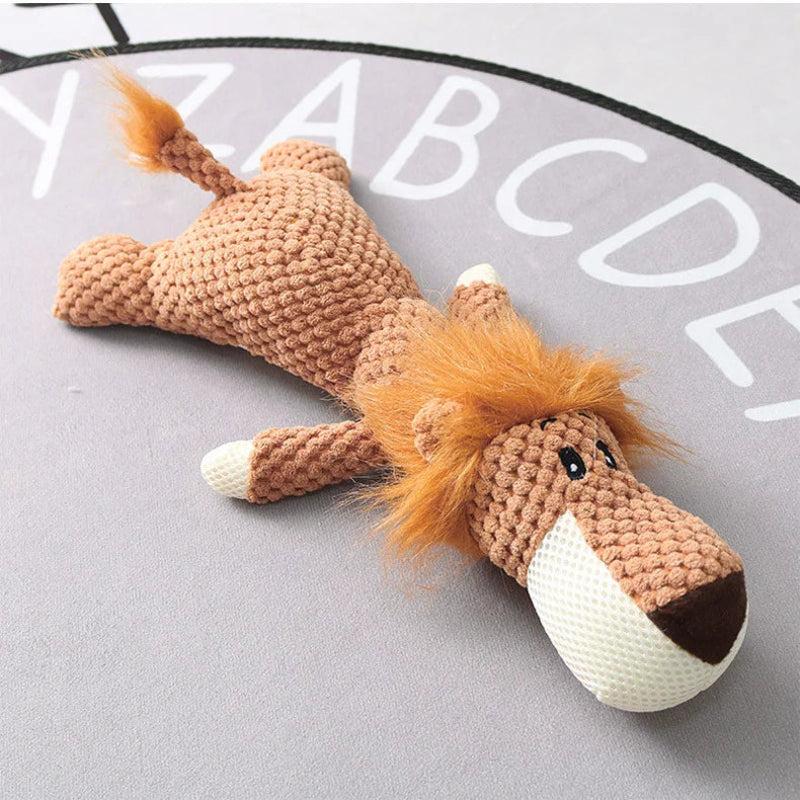 Knitted horse toy on a surface with letters in the background