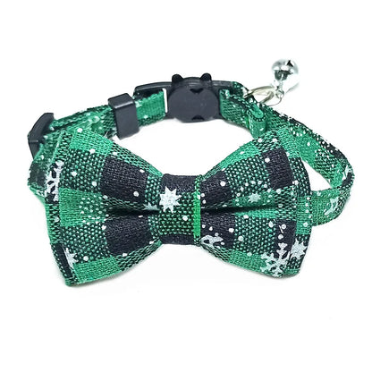 Green and black checkered bow tie pet collar with star embellishments on a white background