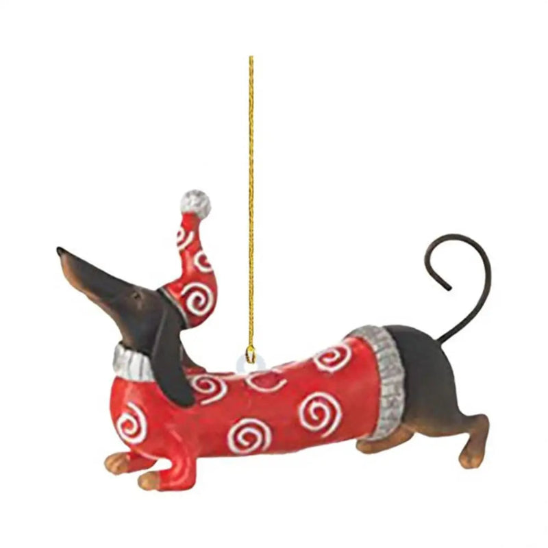 Decorative dachshund ornament wearing a red sweater with white patterns and a Santa hat on a white background.