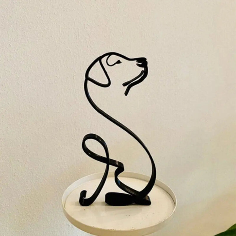 Black wire dog sculpture on a beige background