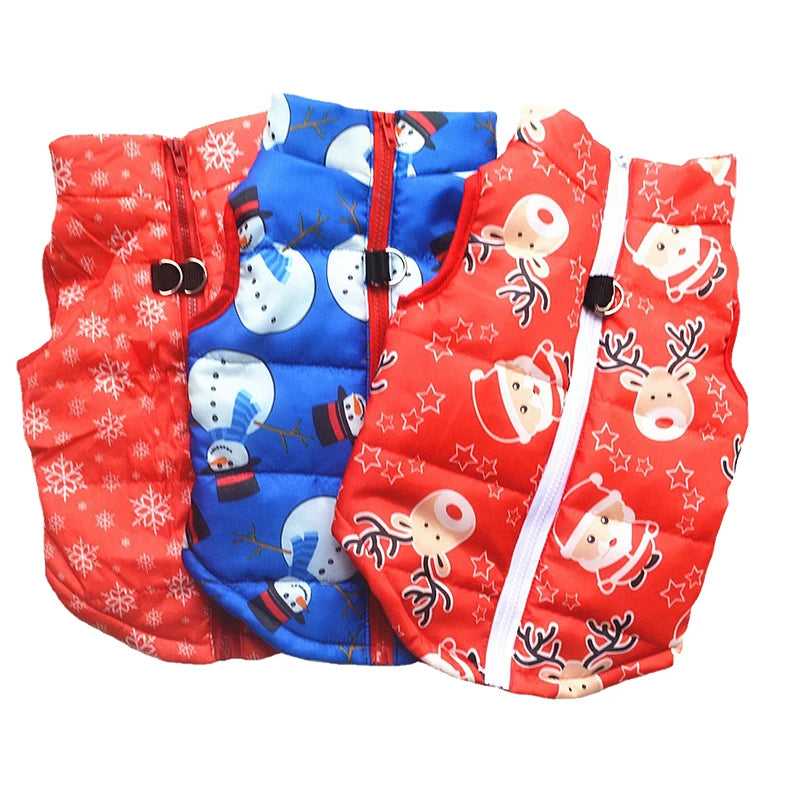 Three children's vests with Christmas-themed patterns on a white background