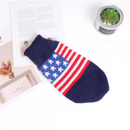 American flag-themed sock on a white surface with a magazine and small plant.