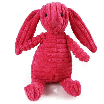 Pink plush bunny toy on a white background