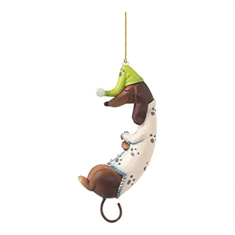 Decorative ornament of a dachshund in a hat on a white background