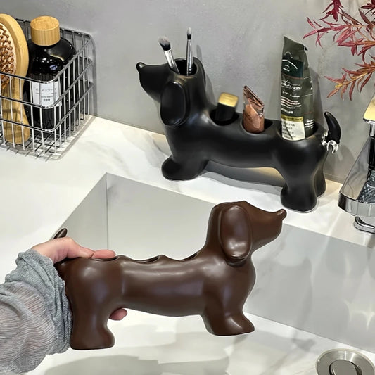 Dog-shaped holder on a bathroom counter with various items.