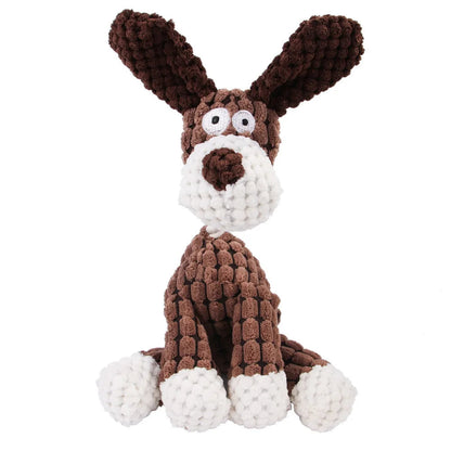 Brown and white knitted dog toy on a white background
